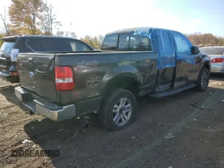 2006 Ford F-150 XLT with VIN 1FTPX14576NA19050, listed as a Copart auction lot 77426344 with 191,587 mi miles and Salvage title. Bid and sale history available at DreamBid. Image 3.