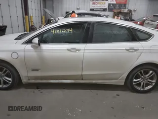 2016 Ford Fusion Titanium with VIN 3FA6P0SU8GR259163, listed as a IAAI auction lot 41812294 with 151,002 mi miles and . Bid and sale history available at DreamBid. Image 14.