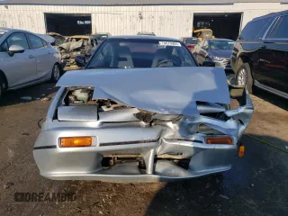 1990 Nissan 240SX z VIN JN1HS36P0LW121487, wystawiony jako Copart lot #70670904 z przebiegiem 123 794 mil mil oraz Szkody całkowita. Historia ofert i sprzedaży dostępna na DreamBid. Obrazek 5.