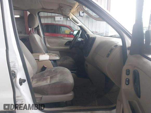 2004 Ford Escape XLS with VIN 1FMYU02134DA08567, listed as a IAAI auction lot 41872076 with 239,602 mi miles and . Bid and sale history available at DreamBid. Image 5.