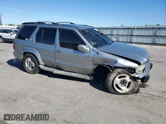 2000 Infiniti QX4 with VIN JNRAR07Y1YW077992, listed as a Copart auction lot 45572015 with 202,385 mi miles and Salvage Title. Bid and sale history available at DreamBid. Image 4.