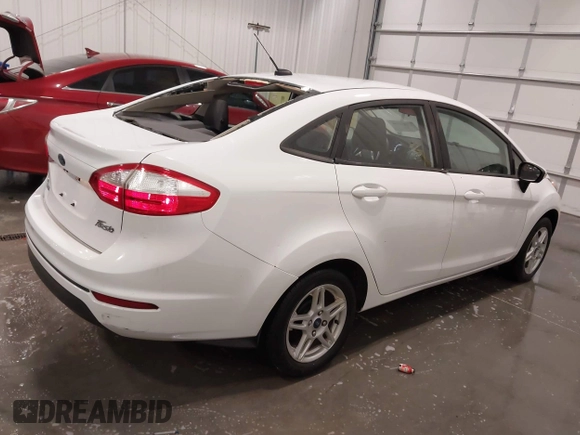 2017 Ford Fiesta SE with VIN 3FADP4BJ5HM156141, listed as a IAAI auction lot 42085359 with 52,015 mi miles and . Bid and sale history available at DreamBid. Image 4.