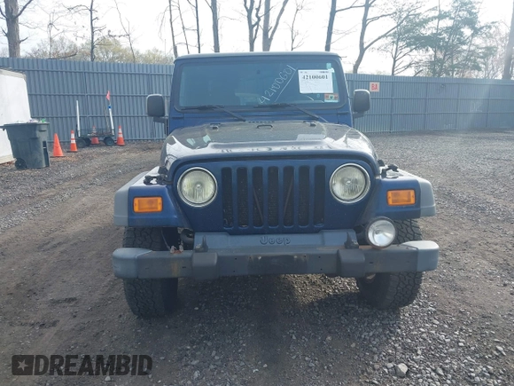 2005 Jeep Wrangler Sport z VIN 1J4FA49S25P302627, wystawiony jako IAAI lot #42100601 z przebiegiem 169 650 mil mil oraz . Historia ofert i sprzedaży dostępna na DreamBid. Obrazek 12.