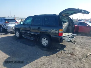 2004 Chevrolet Tahoe LS with VIN 1GNEC13V04R178784, listed as a IAAI auction lot 42013755 with 126,162 mi miles. Bid and sale history available at carsss.com. Image 3.