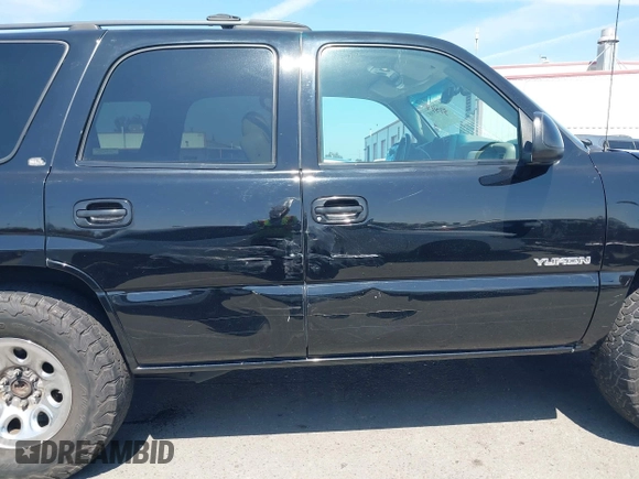 2002 GMC Yukon SLT with VIN 1GKEC13T92R162978, listed as a IAAI auction lot 41851599 with 213,789 mi miles. Bid and sale history available at carsss.com. Image 13.