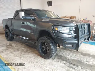2019 Ram 1500 Laramie with VIN 1C6SRFJT2KN516917, listed as a IAAI auction lot 41975764 with 106,214 mi miles and . Bid and sale history available at DreamBid. Image 1.