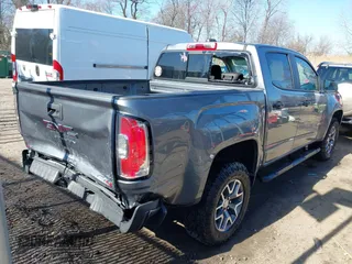 2021 GMC Canyon 4WD AT4 w/Leather with VIN 1GTG6FENXM1282684, listed as a IAAI auction lot 41757981 with 44,807 mi miles. Bid and sale history available at carsss.com. Image 4.