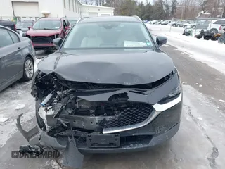 2021 Mazda CX-30 Premium with VIN 3MVDMBDY1MM269353, listed as a IAAI auction lot 41644391 with 29,409 mi miles and . Bid and sale history available at carsss.com. Image 12.
