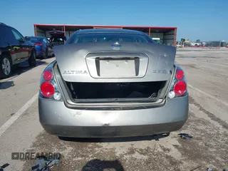 2005 Nissan Altima S z VIN 1N4AL11D05C281697, wystawiony jako IAAI lot #42220810 z przebiegiem 104 047 mil mil oraz . Historia ofert i sprzedaży dostępna na DreamBid. Obrazek 16.