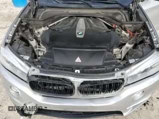 2015 BMW X5 xDrive50i with VIN 5UXKR6C51F0J74160, listed as a Copart auction lot 79337044 with 143,436 mi miles and Salvage title. Bid and sale history available at DreamBid. Image 14.