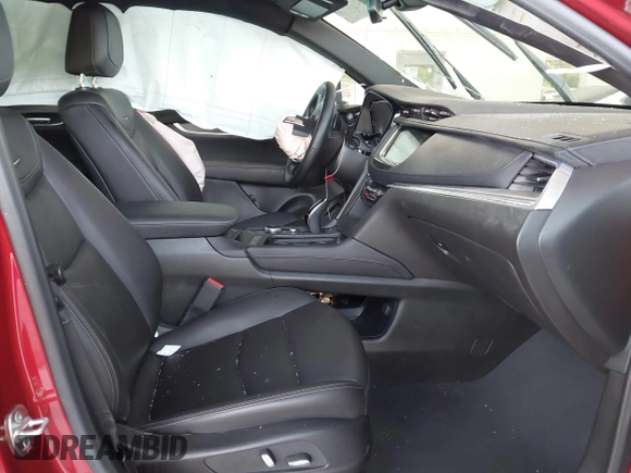 2024 Cadillac XT5 FWD Luxury with VIN 1GYKNAR42RZ738679, listed as a IAAI auction lot 42355530 with 14,660 mi miles and . Bid and sale history available at DreamBid. Image 5.