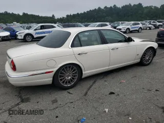 2007 Jaguar XJ with VIN SAJWA71B67SH12726, listed as a Copart auction lot 64840394 with 71,363 mi miles and Salvage Title. Bid and sale history available at carsss.com. Image 3.
