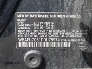 2013 BMW 5 Series 535i xDrive with VIN WBAFU7C51DDU75974, listed as a IAAI auction lot 41837789 with 216,394 mi miles and . Bid and sale history available at carsss.com. Image 9.