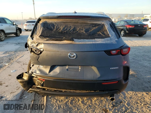 2023 Mazda CX-50 S Premium Plus with VIN 7MMVABEM3PN102285, listed as a Copart auction lot 77684064 with 14,190 mi miles and Salvage Title. Bid and sale history available at DreamBid. Image 6.