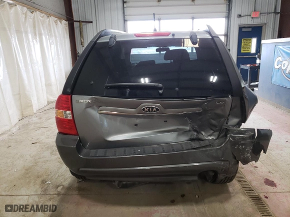 2007 Kia Sportage LX with VIN KNDJF724077380793, listed as a Copart auction lot 50289545 with 112,138 mi miles and Salvage Title. Bid and sale history available at carsss.com. Image 6.