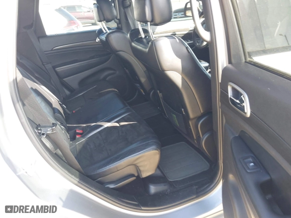 2018 Jeep Grand Cherokee Laredo E with VIN 1C4RJFAG0JC284927, listed as a IAAI auction lot 41964013 with 130,145 mi miles. Bid and sale history available at carsss.com. Image 8.