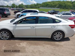 2014 Toyota Avalon Limited with VIN 4T1BK1EB4EU105266, listed as a IAAI auction lot 42006448 with 111,822 mi miles. Bid and sale history available at carsss.com. Image 14.