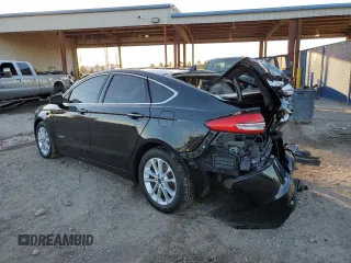 2019 Ford Fusion Hybrid SEL with VIN 3FA6P0MU7KR260813, listed as a Copart auction lot 73311492 with 70,783 mi miles. Bid and sale history available at carsss.com. Image 2.