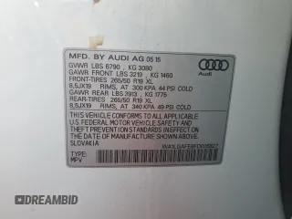 2015 Audi Q7 Premium Plus z VIN WA1LGAFE8FD026827, wystawiony jako Copart lot #55483895 z przebiegiem 102 239 mil mil oraz Szkoda całkowita • Salvage title. Historia ofert i sprzedaży dostępna na DreamBid. Obrazek 13.