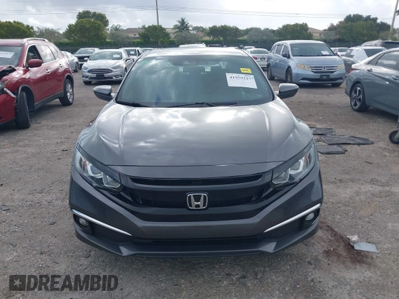 2019 Honda Civic Sport with VIN 2HGFC2F89KH563333, listed as a IAAI auction lot 41959217 with 66,068 mi miles and . Bid and sale history available at DreamBid. Image 12.