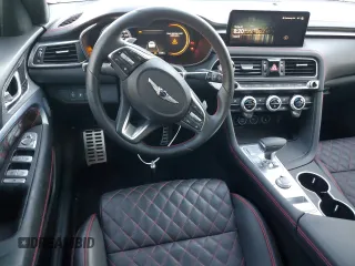 2023 Genesis G70 3.3T with VIN KMTG54TE0PU128774, listed as a Copart auction lot 72209364 with 14,186 mi miles and Salvage Title. Bid and sale history available at carsss.com. Image 8.