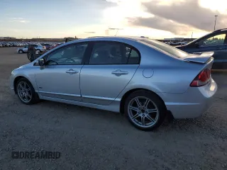 2010 Acura CSX Technology z VIN 2HHFD5F77AH201887, wystawiony jako Copart lot #77610604 z przebiegiem 94 442 mil mil oraz Szkody całkowita. Historia ofert i sprzedaży dostępna na DreamBid. Obrazek 2.