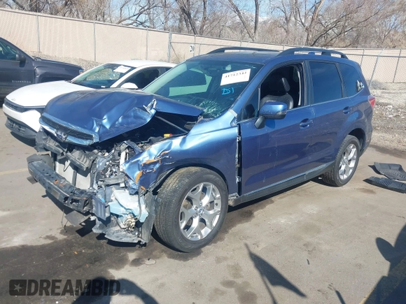 2018 Subaru Forester Touring z VIN JF2SJAWC5JH579570, wystawiony jako IAAI lot #41712344 z przebiegiem 102 251 mil mil oraz . Historia ofert i sprzedaży dostępna na DreamBid. Obrazek 2.