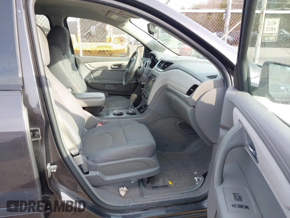 2015 Chevrolet Traverse LS z VIN 1GNKVFEDXFJ134436, wystawiony jako IAAI lot #41773596 z przebiegiem 156 326 mil mil oraz . Historia ofert i sprzedaży dostępna na DreamBid. Obrazek 5.