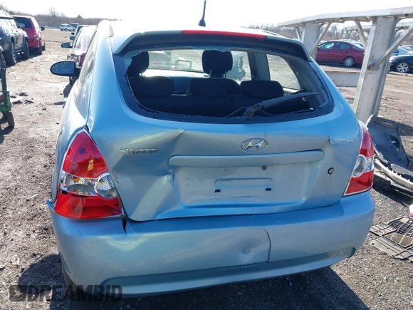 2007 Hyundai Accent SE with VIN KMHCN36CX7U031496, listed as a IAAI auction lot 41811183 with 201,740 mi miles. Bid and sale history available at carsss.com. Image 6.