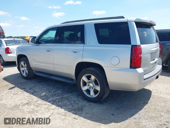 2015 Chevrolet Tahoe LT with VIN 1GNSCBKC9FR223426, listed as a IAAI auction lot 42352698 with 128,339 mi miles and . Bid and sale history available at DreamBid. Image 3.