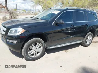 2014 Mercedes-Benz GL 450 z VIN 4JGDF7CE1EA342408, wystawiony jako IAAI lot #41968441 z przebiegiem 120 459 mil mil oraz . Historia ofert i sprzedaży dostępna na DreamBid. Obrazek 17.