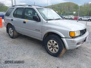 1998 Honda Passport LX z VIN 4S6CM58W6W4403573, wystawiony jako IAAI lot #42083436 z przebiegiem 225 015 mil mil oraz . Historia ofert i sprzedaży dostępna na DreamBid. Obrazek 1.