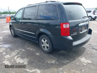 2010 Dodge Grand Caravan SXT with VIN 2D4RN5D11AR459864, listed as a IAAI auction lot 42197818 with 149,553 mi miles and . Bid and sale history available at DreamBid. Image 3.