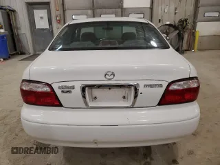 2000 Mazda 626 LX with VIN 1YVGF22C1Y5164480, listed as a Copart auction lot 42545885 with 152,489 mi miles and Clean Title. Bid and sale history available at carsss.com. Image 6.