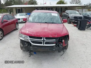 2014 Dodge Journey SXT z VIN 3C4PDCBB3ET153212, wystawiony jako IAAI lot #41897261 z przebiegiem 151 439 mil mil oraz . Historia ofert i sprzedaży dostępna na DreamBid. Obrazek 13.