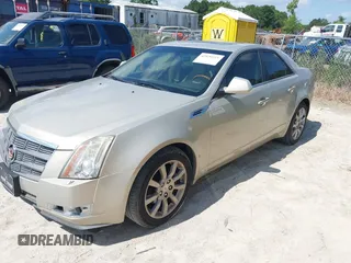 2008 Cadillac CTS RWD with VIN 1G6DF577X80208661, listed as a IAAI auction lot 42520115 with 104,756 mi miles and . Bid and sale history available at DreamBid. Image 2.