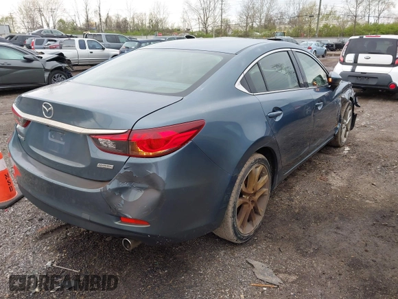 2016 Mazda Mazda6 i Touring with VIN JM1GJ1V56G1439360, listed as a IAAI auction lot 41987987 with 155,271 mi miles. Bid and sale history available at carsss.com. Image 4.