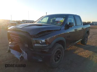 2017 Ram 1500 Rebel z VIN 1C6RR7YT0HS534465, wystawiony jako IAAI lot #41240431 z przebiegiem 125 886 mil mil oraz . Historia ofert i sprzedaży dostępna na DreamBid. Obrazek 2.