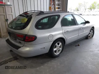 2001 Ford Taurus SE Standard with VIN 1FAFP58U91G202523, listed as a IAAI auction lot 42092190 with 197,961 mi miles. Bid and sale history available at carsss.com. Image 4.