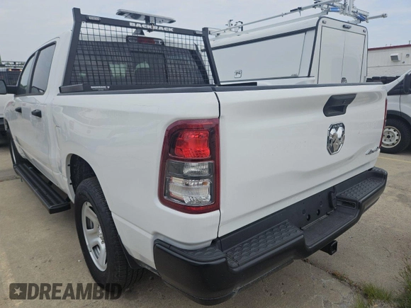 2023 Ram 1500 Tradesman with VIN 1C6RRFGG9PN620482, listed as a IAAI auction lot 42796098 with 146 mi miles and . Bid and sale history available at DreamBid. Image 6.