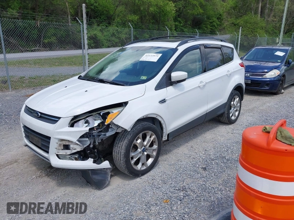 2013 Ford Escape SE with VIN 1FMCU0G90DUB37052, listed as a IAAI auction lot 42132973 with 169,975 mi miles and . Bid and sale history available at DreamBid. Image 19.