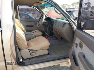 1999 Toyota Tacoma with VIN 4TAPM62NXXZ439318, listed as a IAAI auction lot 41721442 with 299,876 mi miles and . Bid and sale history available at DreamBid. Image 5.