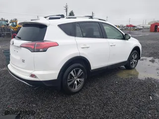 2017 Toyota RAV4 XLE with VIN JTMRFREV2HD212188, listed as a IAAI auction lot 41216790 with 79,594 mi miles. Bid and sale history available at carsss.com. Image 4.