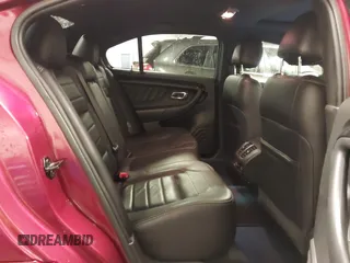 2014 Ford Taurus SHO with VIN 1FAHP2KT9EG130834, listed as a IAAI auction lot 41748199 with 98,857 mi miles and . Bid and sale history available at carsss.com. Image 8.