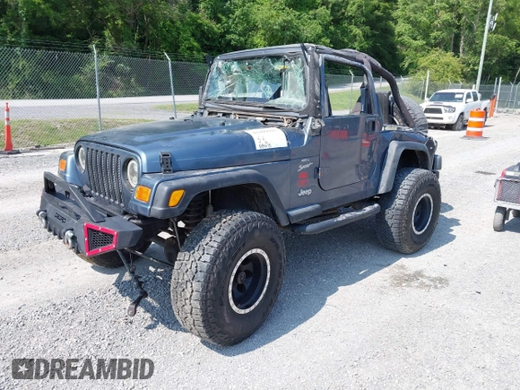 2001 Jeep Wrangler Sport z VIN 1J4FA49S11P322636, wystawiony jako IAAI lot #42409917 z przebiegiem 88 675 mil mil oraz . Historia ofert i sprzedaży dostępna na DreamBid. Obrazek 2.