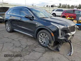 2021 Cadillac XT4 AWD Premium Luxury with VIN 1GYFZDR4XMF016846, listed as a Copart auction lot 82963704 with 44,063 mi miles and Salvage Title. Bid and sale history available at carsss.com. Image 4.