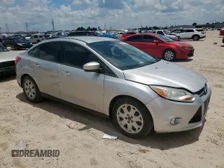 2012 Ford Focus SE with VIN 1FAHP3F29CL287498, listed as a Copart auction lot 61476855 with 139,801 mi miles and Salvage title. Bid and sale history available at DreamBid. Image 4.