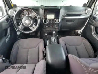 2013 Jeep Wrangler Unlimited Sahara with VIN 1C4BJWEG4DL536694, listed as a Copart auction lot 57714035 with 146,257 mi miles and Salvage title. Bid and sale history available at DreamBid. Image 8.