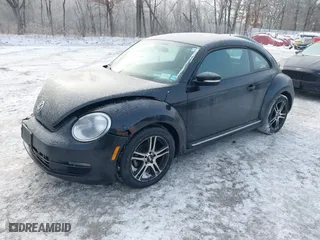 2012 Volkswagen Beetle 2.5L PZEV with VIN 3VWJP7AT8CM619137, listed as a IAAI auction lot 41195954 with 157,741 mi miles. Bid and sale history available at carsss.com. Image 17.