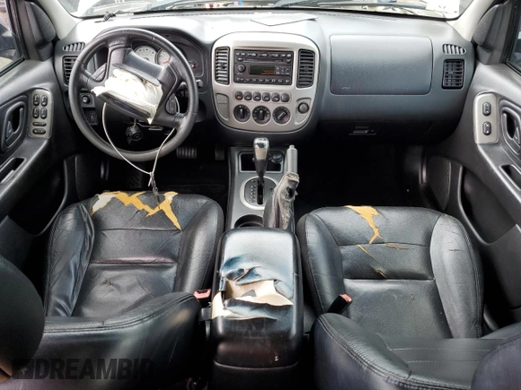 2005 Ford Escape Limited with VIN 1FMCU94165KA11181, listed as a Copart auction lot 62880725 with 180,152 mi miles and Salvage title. Bid and sale history available at DreamBid. Image 8.